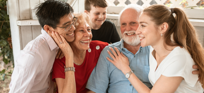 multi-generational family smiling