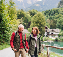 couple outside holding hands hiking