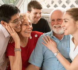 multi-generational family smiling